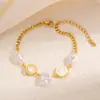 Pulseira de Aço Titânio Dourado Incrustada com Turquesa Pulseira Borboleta Cubana de Aço Inoxidável Joias Simples da Moda Europeia e Americana Atacado