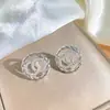 [Set] Elegante conjunto de collar y pendientes de circonita cúbica transfronterizo, diseño de trébol de cuatro hojas, totalmente incrustado de diamantes, joyería versátil y lujosa