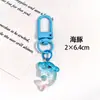 Lindo llavero de resina translúcida con diseño de animal marino de dibujos animados, colgante para decoración de bolso, llavero creativo y de alto valor