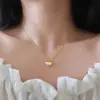 Colar de Amor Coreano Corrente para Clavícula Feminina Luxo Leve Senso de Design de Nicho 2023 Novo Pingente de Aço Titânio Versátil Simples