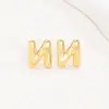 Pendientes de letras de burbuja lisas con baño de cobre y oro real transfronterizos, moda, temperamento, Joker, nuevos pendientes exquisitos, venta al por mayor