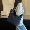 Bolsa tote casual de gran capacidad para mujer, nuevo bolso de hombro otoño 2026, bolsa de alta apariencia para estudiantes universitarios que van a clase