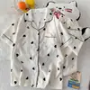 Venta al por mayor transfronteriza de conjunto de pijama de tres piezas nuevo para mujer: cárdigan, top de manga corta, pantalones largos, pantalones cortos, conjunto de ropa de casa de dibujos animados del gato KT