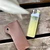 Nuevo Encendedor Portátil Estilo Retro Tradicional de Una Yuan Accesorios Funda Protectora de Cuero Montaje en Cintura Color Sólido Encendedor Estuche de Cuero