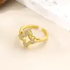 Huajie Europeu e Americano Exportação Recorte Completo Diamante Trevo Elegante Romântico Aberto Anel de Cobre Joias Femininas Venda por Atacado ao Vivo