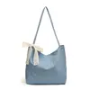 Bolso de hombro versátil transfronterizo coreano y japonés para mujer, nueva moda de otoño, mezclilla, para ir al trabajo, bolso de mano simple urbano