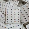 Suministro directo de fábrica acero inoxidable 316 aretes médicos para perforación de oreja una variedad de color de pedrería mariposa hebilla pistola para perforación de oreja
