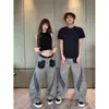 Jeans de pierna ancha unisex originales para otoño/invierno, estilo callejero americano, estampado de leopardo, patchwork, diseño de corte holgado, pierna curva, modernos