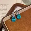 Ambiente Romántico Luz Colgante Sabor Menta Paraíba Moda de Lujo Diamante Aguamarina Diamante Huevo de Paloma Anillo de Diamante Conjunto para Mujer