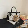 Bolsa de Mão Estilo Coreano Retrô tipo Balde Feminina 2026 Novo Estilo para o Dia a Dia Versátil Casual Bolsa Transversal