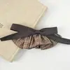 Pinza de resorte de lazo retro para mujer, nuevo estilo 2026, pinza para el pelo de alta gama para la parte posterior de la cabeza, adecuada para coletas altas, accesorio para el cabello