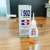 Venta al por mayor de fábrica Pegamento 502 al por mayor Papelería de oficina Vendedor ambulante Uso diario Adhesivo Fuerte Pegamento Universal Suministros para reparación de zapatos
