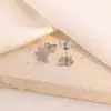 Novedades en Stock Acero Inoxidable 304 Corte Láser Patrón de Flor de Hoja de Arce Aretes de Botón Aretes para Perforación de Hélice