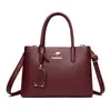 Bolso de mano pequeño cuadrado para mujer 2026, nuevo, minimalista y elegante, de cuero suave, moderno y versátil, bolso cruzado con estilo