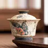 Tazón Cubierto Azul y Blanco Flintstone Rojo Dorado Pintado del Fabricante Tazón de Té Jin'An con Tapa Flor de Amor Mariposa Juego de Té de Cerámica Taza de Té de Gran Capacidad