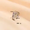 Anillo de acero de titanio con diseño transfronterizo de Europa y Estados Unidos para mujer, ligero, de lujo, de alta gama, con apertura de nicho, anillo de acero inoxidable chapado en oro, venta al por mayor