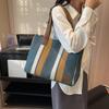 Bolso de rayas de gran capacidad para mujer, nuevo bolso de tela 2024, bolso de trabajo informal de moda, bolso de clase, bolso cruzado de un solo hombro en color contrastante.
