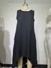 Vestido de marca independiente, estilo vacacional de verano transfronterizo europeo y americano, vestido sin mangas de color liso, corte holgado, cuello redondo, vestido largo asimétrico