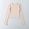 7699-26 Camiseta de manga comprida com gola redonda, corte slim, cintura marcada, estilo básico, coleção de primavera, versão coreana, slim fit, camiseta pequena de gola redonda