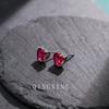Aretes de moda transfronteriza amor rubí rojo temperamento en forma de corazón aretes simples sintéticos rojo sangre de paloma aretes de moda para niñas
