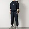 Novo conjunto de moletom em tricô waffle para homens, outono, camiseta de manga comprida cor sólida e calça comprida, esportivo e casual, atacado transfronteiriço