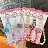 Cadena Creativa para Teléfono Móvil con Lazo de Diamante y Cuentas de Cristal Llavero Colgante Lindo para Bolso Llavero de Llave de Coche Venta al por Mayor