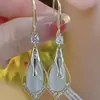 Pendientes Minimalistas de Estilo Niche de Lujo Ligero con un Toque de Alta Gama, Pendientes de Rombo Geométrico con Piedra Ojo de Gato, Tendencia Transfronteriza Caliente 2026