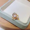 Venta al por mayor de perlas de Zhuji Set de perlas naturales de agua dulce de 9-10 mm Pendientes de zircón en espiral Colgante Anillo Juego de tres piezas