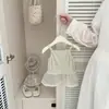 Conjunto elegante para niñas de principios de otoño: Conjunto de dos piezas para niños pequeños en primavera y otoño: camisola de retazos de malla y camiseta de manga larga floral