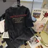 Camiseta vieja lavada algodón callejera americana manga corta amantes 2025 verano oversize estampado de letras