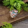 Anillo elástico de flor geométrica hueca de nuevo color esmaltado transfronterizo, moda femenina, racimo de flores versátil, anillo de alta gama