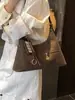 2026 Nueva Bolsa Retro de Gran Capacidad para Viajes Diarios Bolso de Hombro Casual para Mujer Sensación de Alta Gama Bolso Cruzado Tipo Dumpling
