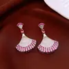 Pendientes de borla con flor de trébol de circonita vintage con un toque de alta gama, pendientes versátiles y de moda al por mayor