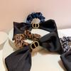Cinta Coreana Titular Retro Elegante Versátil Moda Hebilla de Metal Nariz de Cerdo Lazo Estampado de Leopardo Lazo para el Cabello