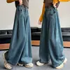 Moda Feminina Calça de Perna Larga Dobrável Outono 2026 Novas Calças Jeans Estilosas Tipo Saia Tom Menina Preguiçosa Calças Longas