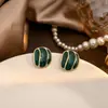 Pendientes de Aguja Plateada con un Toque de Lujo Ligero, Tachuelas Pequeñas de Perla, Geométricos Retro Ojo de Gato Flor Lazo Pendientes Suaves de Perla