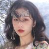 Nuevo estilo Miao estilo étnico exótico Decoración de frente con borlas de campanas Plata vintage Xizang Cadena para la frente Colgante para cejas Tocado de estilo antiguo para mujer