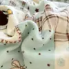 2026 Nueva Clase A Grado Madre e Hijo Estilo Ins Peso Alto por Metro Cuadrado Borde de Concha de Vellón de Leche Cubierta de Cama de Algodón Juego de Cuatro Piezas Artículo Popular Flor
