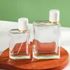Frasco de Perfume Transparente Espesso com Tampa de Encaixe 50ml Frasco Borrifador de Fragrância Tipo Pressão Portátil Frasco de Cosméticos para Maquiagem