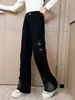 Calça Jeans Feminina Lavagem Americana Preto Tie-Dye Patch de Borboleta Outono 2025 Nova Solta Reta Perna Larga