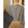 Cárdigan de punto calado de encaje azul de manga larga para mujer, principios de otoño, de alta gama, único, hermoso, suave y juvenil, suéter suave y acogedor