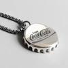 Marca de moda hip-hop europeia e americana cola garrafa tampa colar homens e mulheres personalidade Coringa suéter cadeia pingente fabricantes atacado