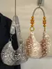 Bolso tipo dumpling esponjoso, simple y elegante, nuevo modelo otoño 2026, adecuado para el trabajo y los desplazamientos, bolso de hombro relajado y único
