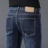 Jeans para hombre de la ciudad de Xintang, Guangzhou, estilo primavera y otoño, pantalones casuales rectos holgados, pantalones de hombre de alta gama para otoño