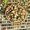 Raíz de Bodhi de caqui natural de Dunhuang tallado en cuentas sueltas para pulsera de mano DIY, joyería para jugar a Wen, accesorios de cuentas de Buda, venta al por mayor de fábrica