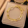 [Pulsera de Moda Caliente Mejor 2] Temperamento Europeo y Americano de Alta Gama K Oro Cruz Acero de Titanio Pulsera Diseño Nicho Estilo Frío Mujeres