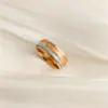 Anillos de Lujo Ligero Color Oro Rosa Europeos y Americanos Transfronterizos para Hombres y Mujeres, Anillos Texturizados de Acero de Titanio, Joyería Versátil de Moda de Acero Inoxidable