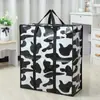 Bolsa de embalaje para equipaje ligera, impermeable, no tejida, portátil, bolsa de mano de gran capacidad engrosada para almacenamiento de artículos, venta al por mayor