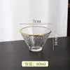 Vidrio resistente al calor soplado a mano textura de patrón de martillo sala de té casera juego de té japonés Kung Fu hecho a mano taza de degustación