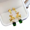 Venta al por mayor de fábrica Pendientes de botón populares de Diopsida natural Plata S925 Incrustado Piedra principal 6*8 Joyería de lujo Venta directa de fábrica